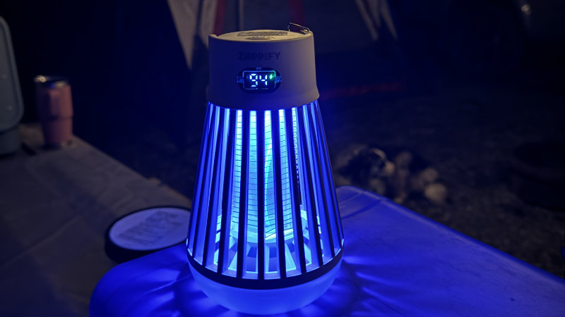 ZapShield mosquito zapper used outdoors on a patio